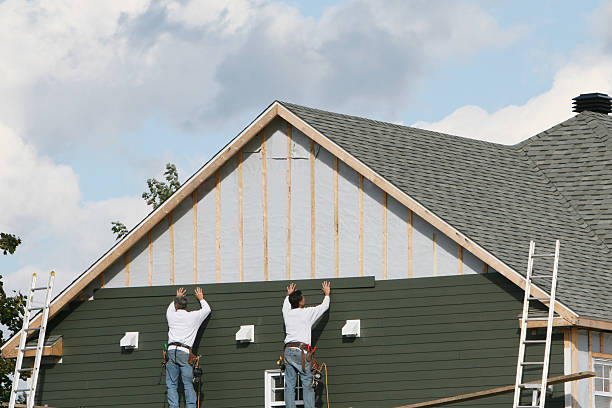 Professional Siding technician working in Fletcher, NC
